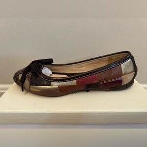 New with tags and in box size 6 Jasmine Holiday PTWK coach shoes metallic color